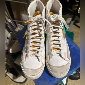 Nike men’s shoes size 9.5  11 in women . The check has reversible sequin